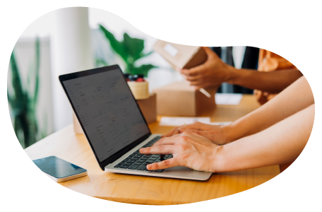 A retailer applying for insurance quotes on a laptop.