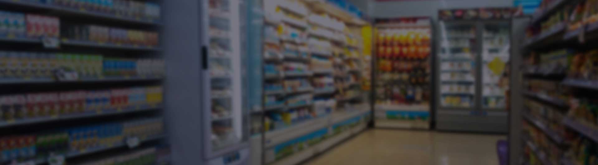 Shelves filled with drugs and supplements at a pharmacy.
