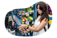 A customer examines a tennis racket at a sporting goods store.