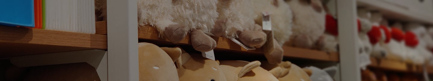 Stuffed animals on a shelf in a toy store. Stuffed animals on a shelf in a toy store.