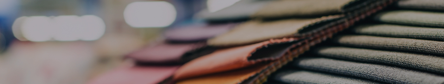 A swatch of color samples at an upholstery shop.