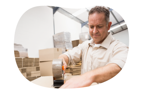 A Walmart seller tapes up a box about to be shipped to a customer. A Walmart seller tapes up a box about to be shipped to a customer.