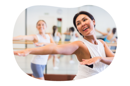 Students practice their moves at a dance studio.