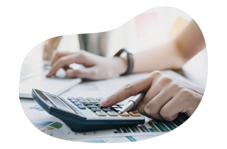 Sports and fitness professional calculating the cost of business insurance.