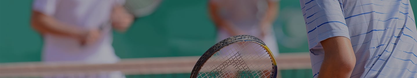 Members of a tennis club playing a match. Members of a tennis club playing a match.