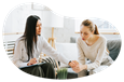 Mental health counselor supporting a patient in an office.