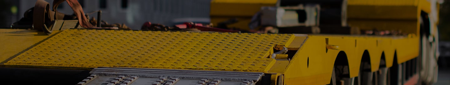 A flatbed truck waiting for a load.