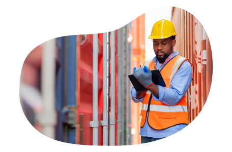 Freight broker employee examining a the contents of shipping containers.