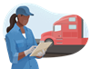 Owner-operator checking a document in front of their freight truck.