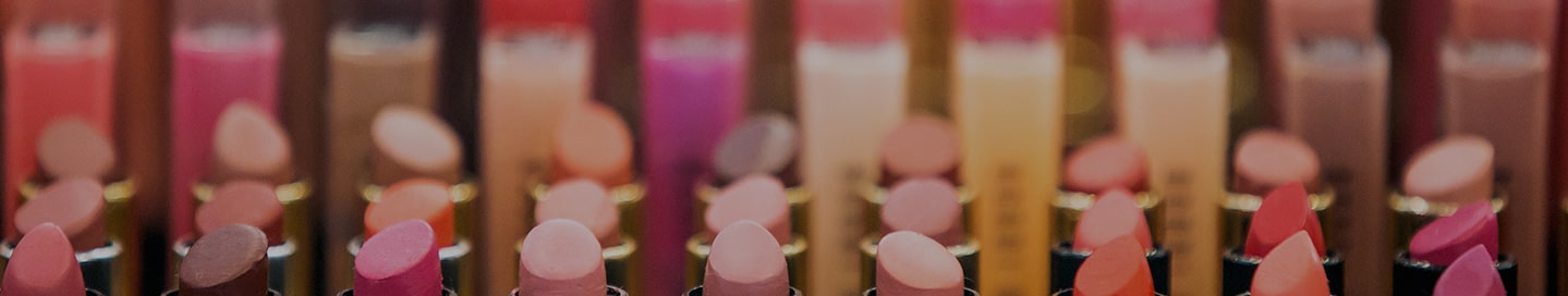 A selection of lipstick in shades of red.