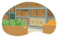 Boxes of watermelons and oranges in a warehouse.
