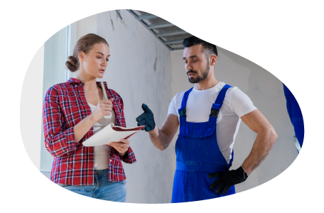 A small business owner reviewing a business proposal from a repair company A small business owner reviewing a business proposal from a repair company