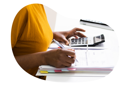 A small business owner calculating their business interruption costs A small business owner calculating their business interruption costs