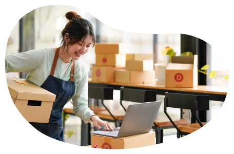 A small business owner reviewing their BOP on a laptop