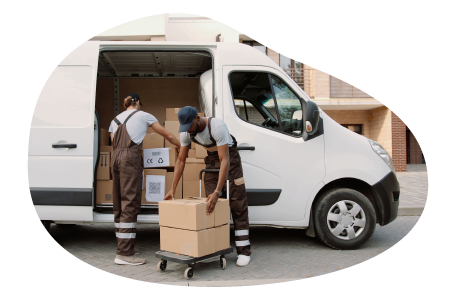 A small business owner and their employee loading the company van with deliveries