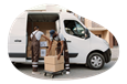 A small business owner and their employee loading the company van with deliveries