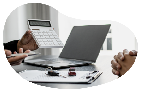 A small business owner calculating their commercial auto costs