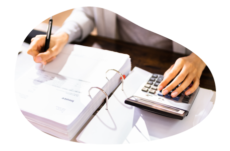 A small business owner calculating their commercial crime insurance payments