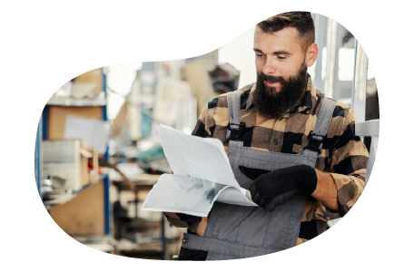 A small business owner reviewing the details of their newly issued commercial package policy A small business owner reviewing the details of their newly issued commercial package policy