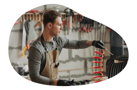 A contractor using their tools to complete a client project A contractor using their tools to complete a client project