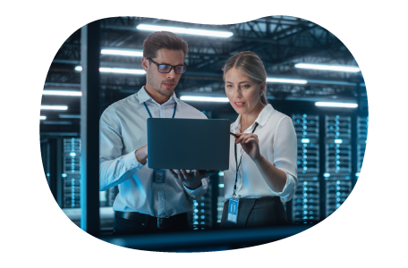 A small business owner discussing their cyber liability policy with a client A small business owner discussing their cyber liability policy with a client