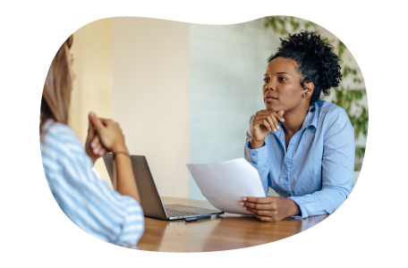 A small business owner discussing their EPLI policy with a lawyer A small business owner discussing their EPLI policy with a lawyer
