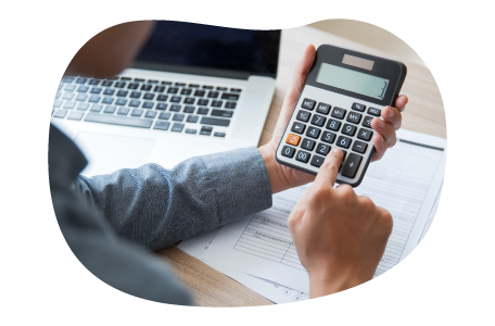 A small business owner calculating their errors and omissions costs