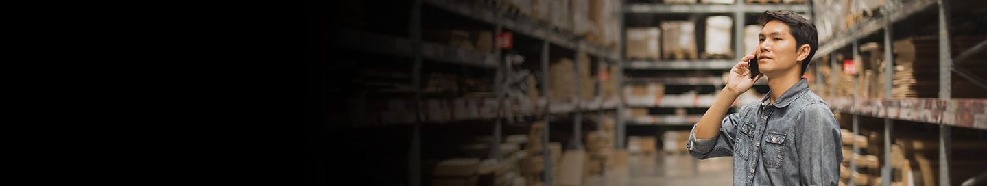 Person looking at storage shelves. Person looking at storage shelves.