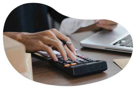 A small business owner calculating their inland marine insurance costs A small business owner calculating their inland marine insurance costs