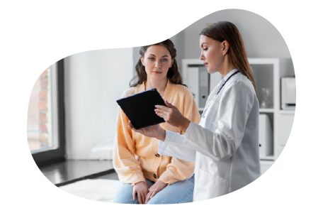 A physician reviews a health plan with their patient 