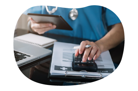 A health professional calculating their medical malpractice costs A health professional calculating their medical malpractice costs