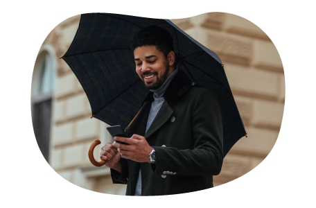 A small business owner reviewing their commercial umbrella policy on their cell phone