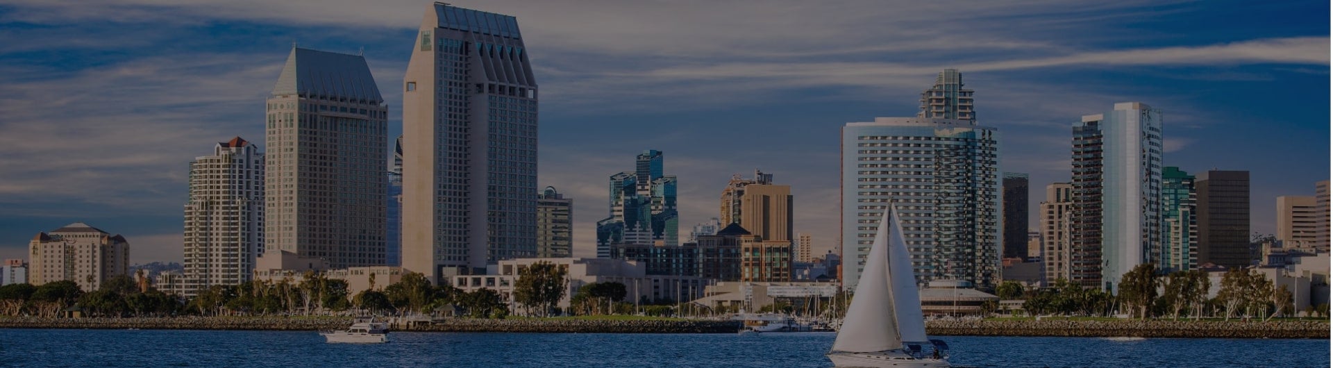 The San Diego skyline and a sailboat. The San Diego skyline and a sailboat.