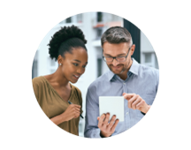 Small business owners fill out an insurance application. Small business owners fill out an insurance application.