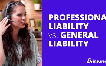 A small business owner talking to a licensed agent about their general liability and professional liability insurance options